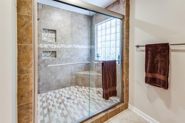 5731 Sam Houston Cir, Austin, TX 78731 - bathroom featuring a shower stall and tile patterned floors