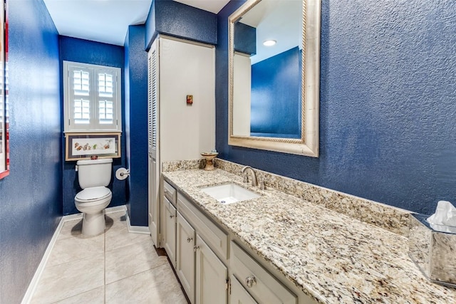 5731 Sam Houston Cir, Austin, TX 78731 - bathroom featuring vanity, tile patterned floors, and a textured wall