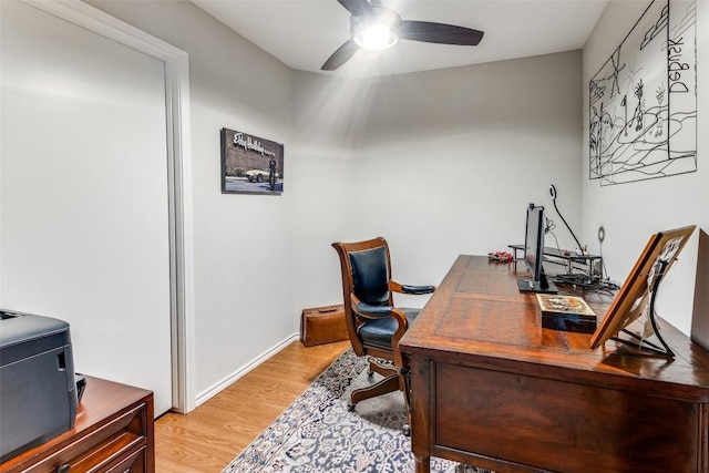 5731 Sam Houston Cir, Austin, TX 78731 - home office with a ceiling fan and light wood finished floors