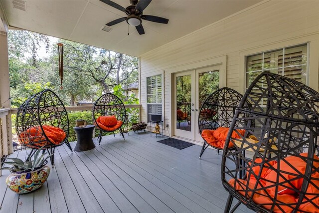 5731 Sam Houston Cir, Austin, TX 78731 - deck with french doors and a ceiling fan