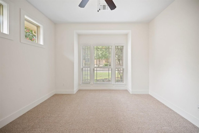 11013 Avery Station Loop Unit 31, Austin, TX 78717 - unfurnished room with healthy amount of natural light, ceiling fan, and light colored carpet