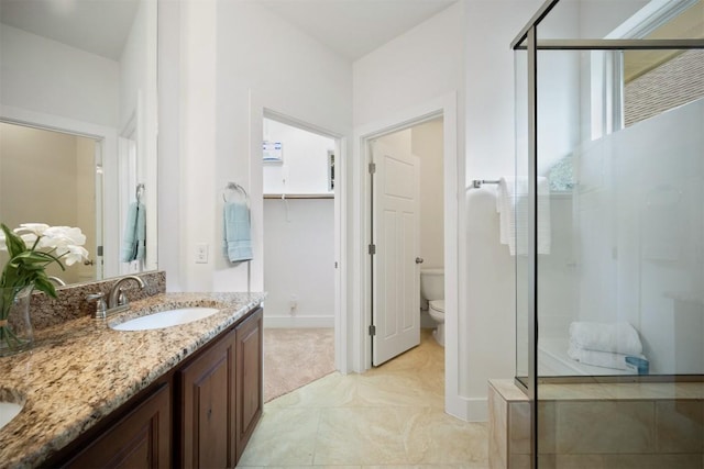 11013 Avery Station Loop Unit 31, Austin, TX 78717 - full bath featuring a shower stall, double vanity, and a spacious closet