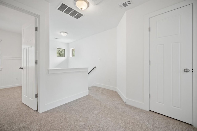 11013 Avery Station Loop Unit 31, Austin, TX 78717 - hall featuring an upstairs landing and carpet