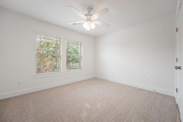 11013 Avery Station Loop Unit 31, Austin, TX 78717 - spare room with ceiling fan and light carpet