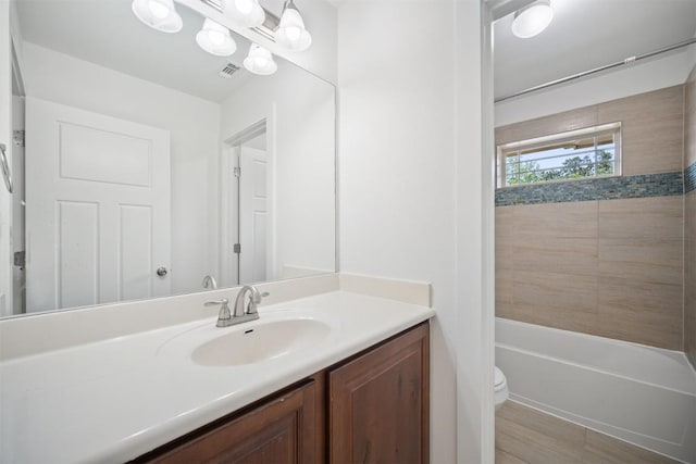 11013 Avery Station Loop Unit 31, Austin, TX 78717 - full bathroom with vanity and toilet