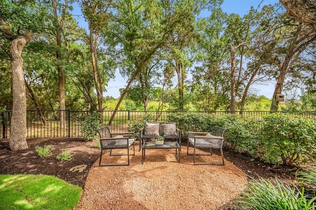 11013 Avery Station Loop Unit 31, Austin, TX 78717 - fenced backyard with an outdoor hangout area and a patio area