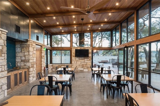 11013 Avery Station Loop Unit 31, Austin, TX 78717 - sunroom with plenty of natural light and beam ceiling