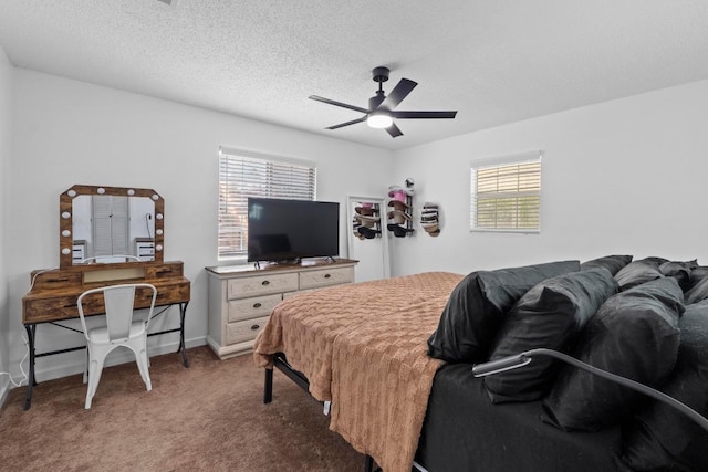 8104 Bronco Ln, Lago Vista, TX 78645 - carpeted bedroom featuring baseboards and a ceiling fan