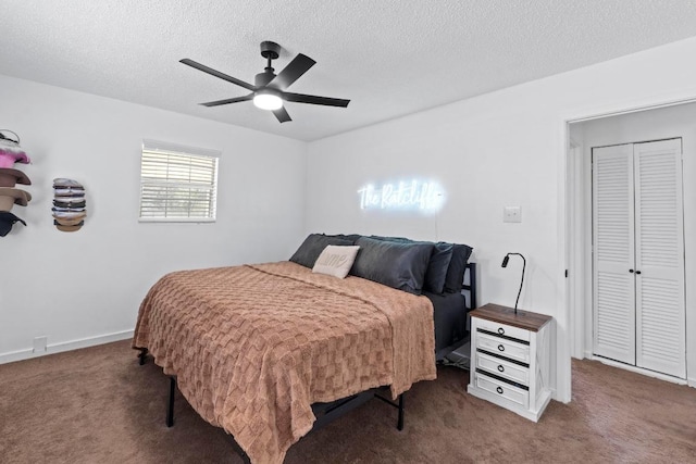8104 Bronco Ln, Lago Vista, TX 78645 - carpeted bedroom with a textured ceiling and ceiling fan