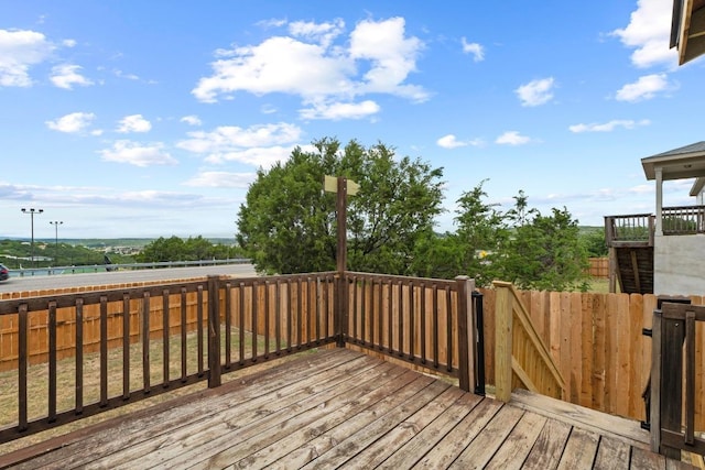 8104 Bronco Ln, Lago Vista, TX 78645 - wooden terrace with a fenced backyard