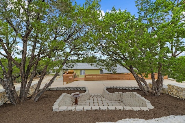 8104 Bronco Ln, Lago Vista, TX 78645 - view of front of home featuring a patio area and a deck