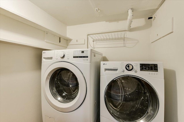 1210 Windsor Rd Unit 113, Austin, TX 78703 - laundry area with washing machine and dryer