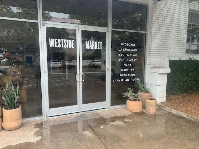 1210 Windsor Rd Unit 113, Austin, TX 78703 - doorway to property featuring brick siding