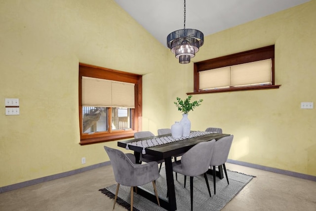 913 Taulbee Ln, Austin, TX 78757 - dining area with a chandelier and concrete flooring