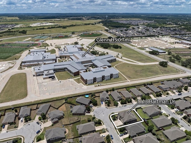 1113 Hartman Dr, Leander, TX 78641 - aerial view of property and surrounding area with nearby suburban area