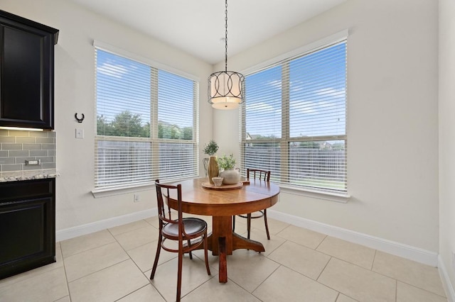 1113 Hartman Dr, Leander, TX 78641 - dining space with light tile patterned floors