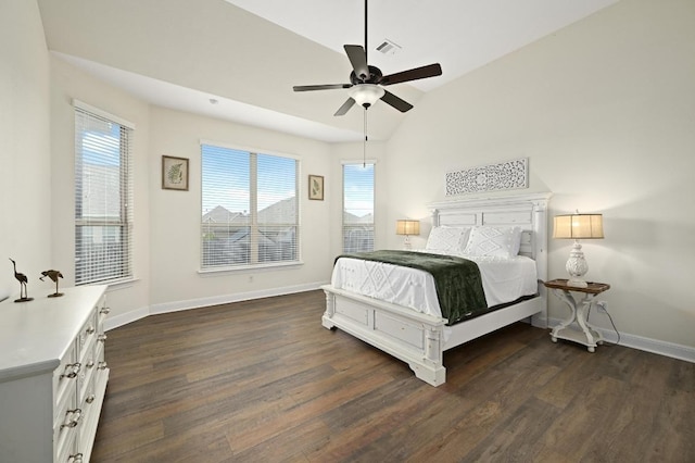 1113 Hartman Dr, Leander, TX 78641 - bedroom featuring dark wood-style floors, multiple windows, ceiling fan, and vaulted ceiling