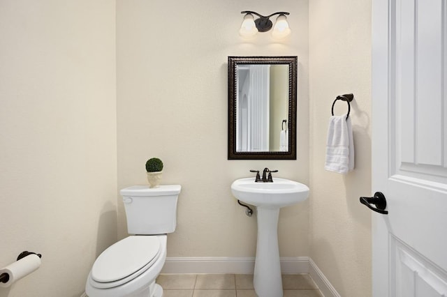 1113 Hartman Dr, Leander, TX 78641 - bathroom with toilet and tile patterned floors