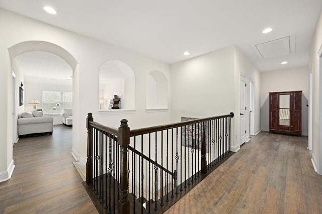 1113 Hartman Dr, Leander, TX 78641 - hallway with attic access, wood finished floors, recessed lighting, and an upstairs landing