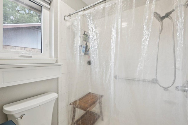 6803 Moonmont Dr, Austin, TX 78745 - bathroom featuring toilet and curtained shower