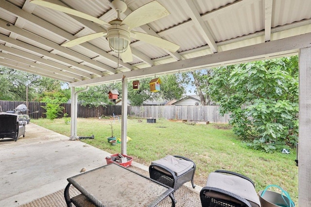 6803 Moonmont Dr, Austin, TX 78745 - fenced backyard featuring a patio and a ceiling fan