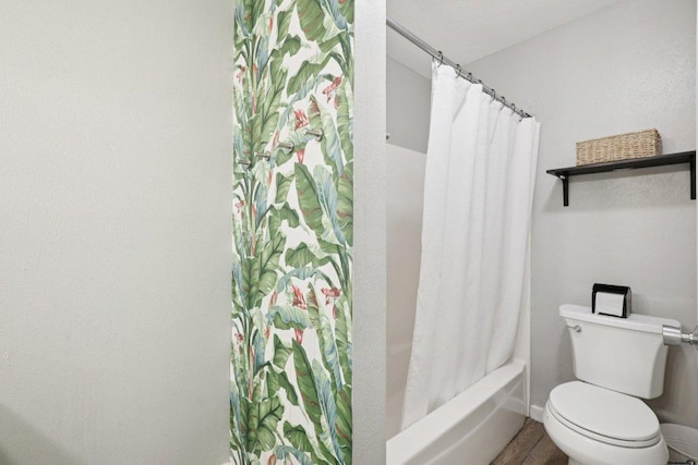 6803 Moonmont Dr, Austin, TX 78745 - full bathroom featuring toilet and shower / tub combo