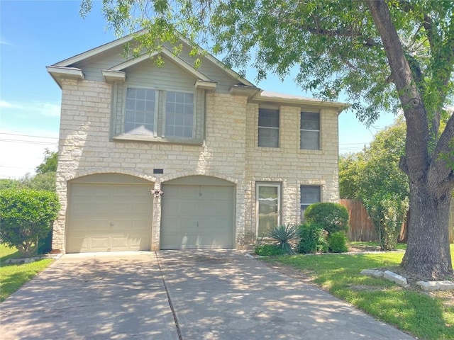 8501 Bismark Cv, Austin, TX 78745 - view of front of property with stone siding, concrete driveway, and an attached garage
