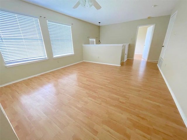 8501 Bismark Cv, Austin, TX 78745 - spare room featuring light wood-style flooring and ceiling fan