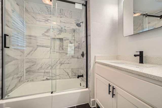 6102 Amber Pass, Austin, TX 78745 - full bathroom with vanity and bath / shower combo with glass door