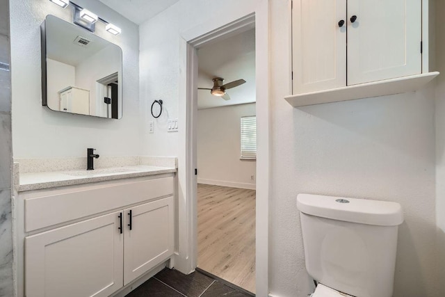 6102 Amber Pass, Austin, TX 78745 - bathroom featuring vanity, a ceiling fan, and tile patterned floors