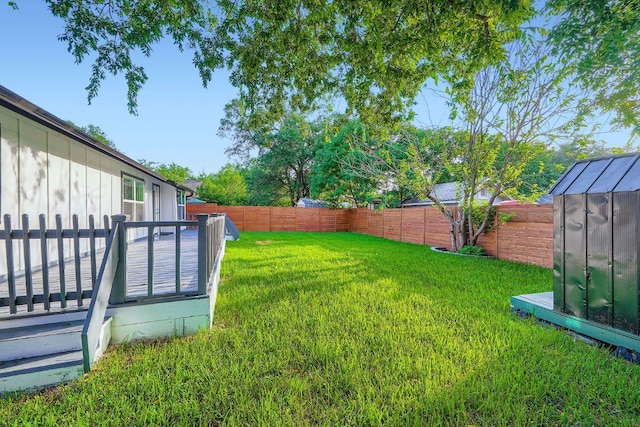 6102 Amber Pass, Austin, TX 78745 - fenced backyard featuring a wooden deck