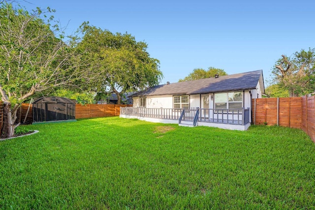6102 Amber Pass, Austin, TX 78745 - rear view of property with a fenced backyard, a shed, and a patio area