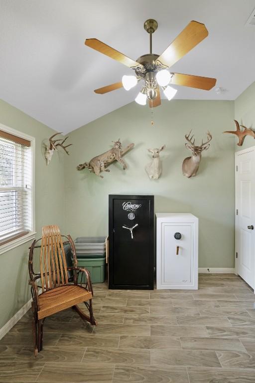 213 S Buffalo Pass, Georgetown, TX 78633 - living area with wood tiled floors and a ceiling fan