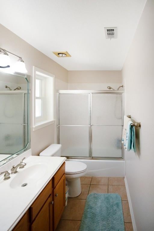 213 S Buffalo Pass, Georgetown, TX 78633 - full bathroom with vanity, tile patterned floors, and enclosed tub / shower combo