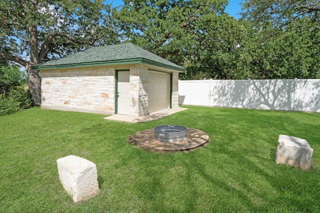 213 S Buffalo Pass, Georgetown, TX 78633 - view of outdoor structure featuring an outdoor fire pit