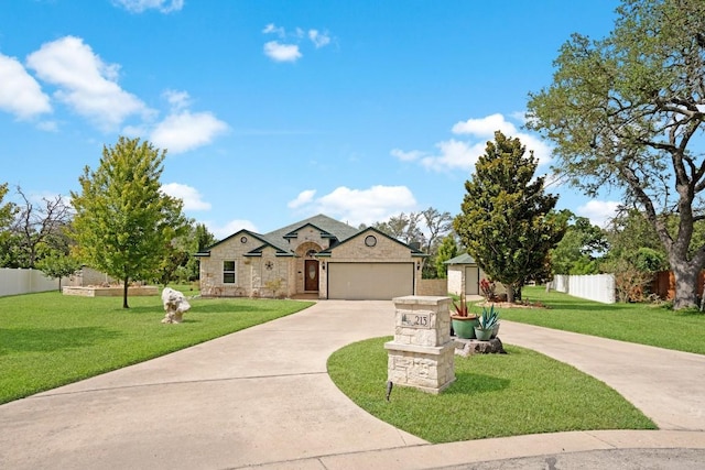 213 S Buffalo Pass, Georgetown, TX 78633 - french country home featuring concrete driveway, an attached garage, and stone siding