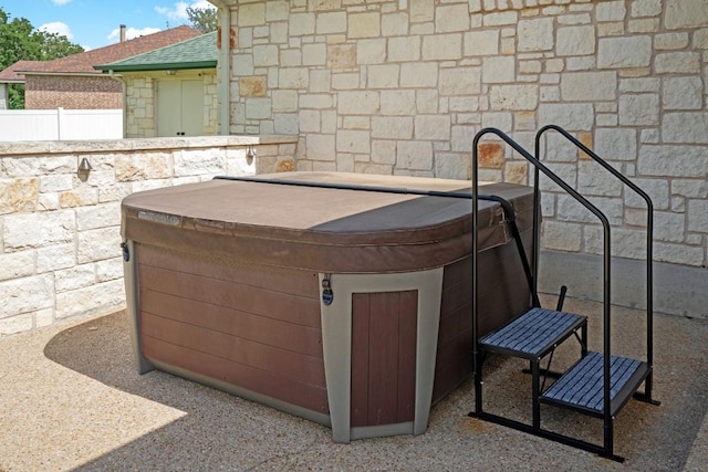213 S Buffalo Pass, Georgetown, TX 78633 - exterior view of a jacuzzi and stone siding