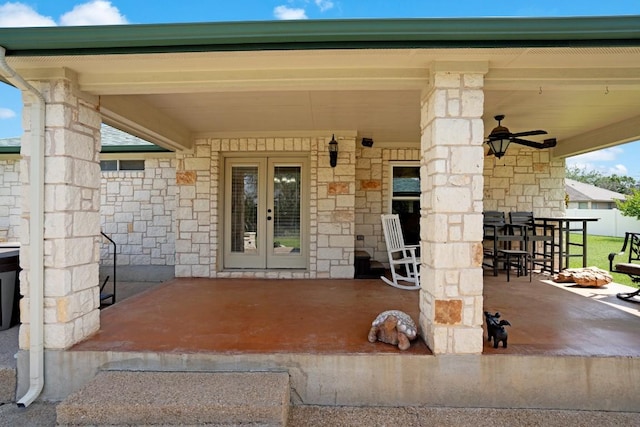 213 S Buffalo Pass, Georgetown, TX 78633 - property entrance with stone siding, french doors, a ceiling fan, and a patio