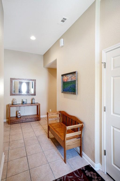 213 S Buffalo Pass, Georgetown, TX 78633 - hallway with light tile patterned floors and recessed lighting