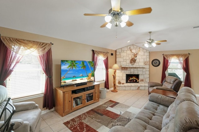 213 S Buffalo Pass, Georgetown, TX 78633 - living area with ceiling fan, light tile patterned floors, vaulted ceiling, and a fireplace