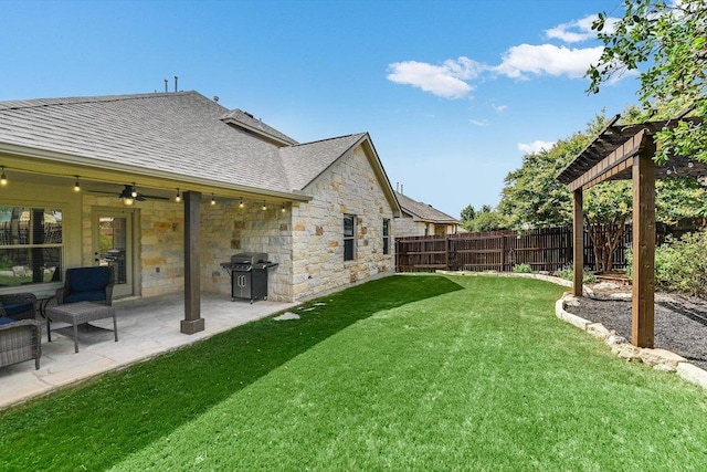 609 Joppa Rd, Leander, TX 78641 - fenced backyard featuring a patio area and a ceiling fan