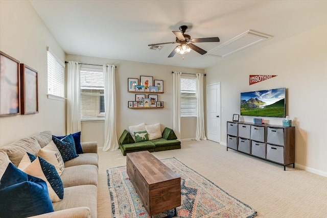 609 Joppa Rd, Leander, TX 78641 - living area featuring attic access, a ceiling fan, and light colored carpet
