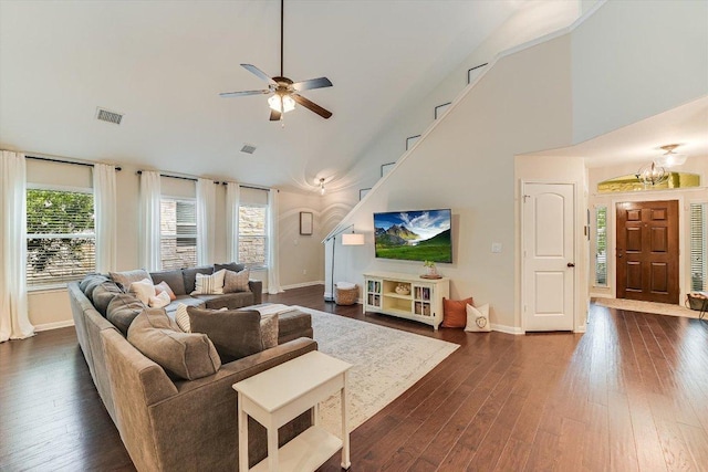 609 Joppa Rd, Leander, TX 78641 - living area featuring a ceiling fan, dark wood-style flooring, high vaulted ceiling, and stairway