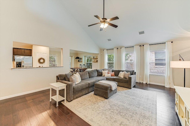 609 Joppa Rd, Leander, TX 78641 - living room featuring high vaulted ceiling, dark wood-type flooring, and a ceiling fan