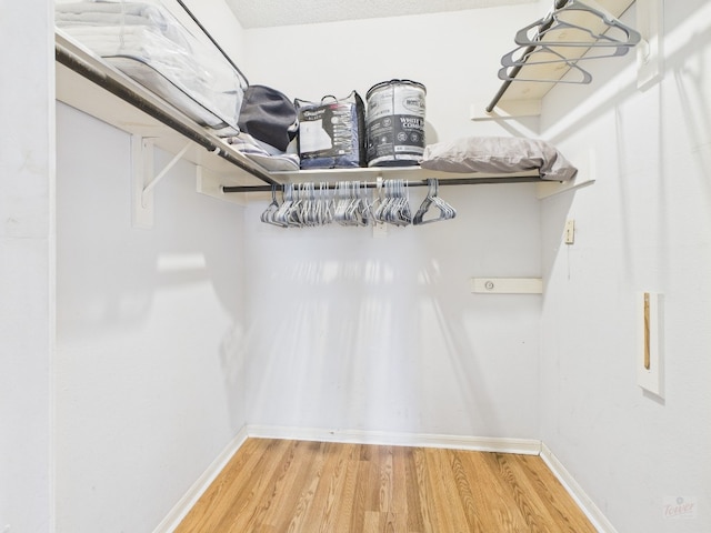 2901 San Jacinto Blvd Unit 110, Austin, TX 78705 - walk in closet with light wood finished floors