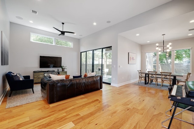 2005 Palo Duro Rd, Austin, TX 78757 - living area featuring light wood-style flooring, a chandelier, recessed lighting, and a ceiling fan
