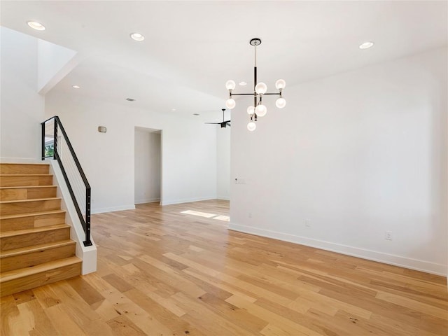 2005 Palo Duro Rd, Austin, TX 78757 - empty room with light wood-style floors, stairs, a chandelier, and recessed lighting