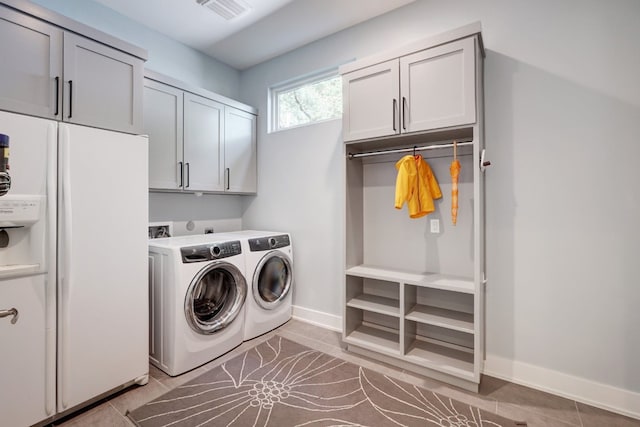 2005 Palo Duro Rd, Austin, TX 78757 - laundry area featuring cabinet space and independent washer and dryer