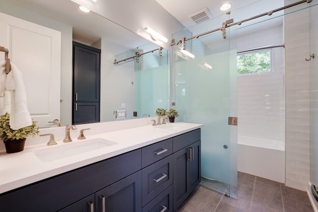 2005 Palo Duro Rd, Austin, TX 78757 - full bathroom featuring double vanity, tile patterned flooring, washtub / shower combination, and recessed lighting