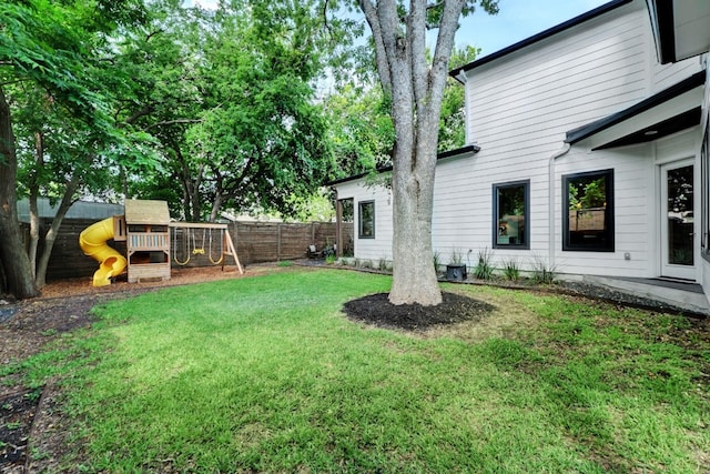 2005 Palo Duro Rd, Austin, TX 78757 - fenced backyard featuring a playground